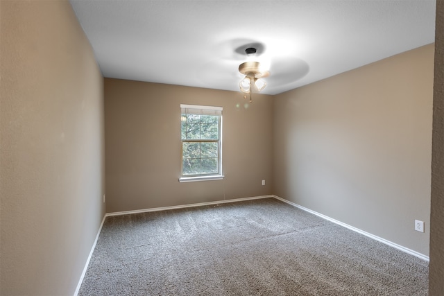 unfurnished room with carpet flooring