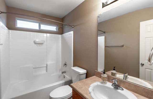 full bathroom with bathtub / shower combination, vanity, and toilet