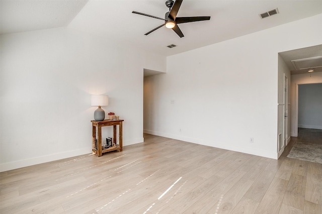 unfurnished living room with light hardwood / wood-style flooring, ceiling fan, and lofted ceiling