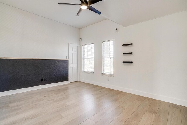 spare room featuring ceiling fan and light hardwood / wood-style floors