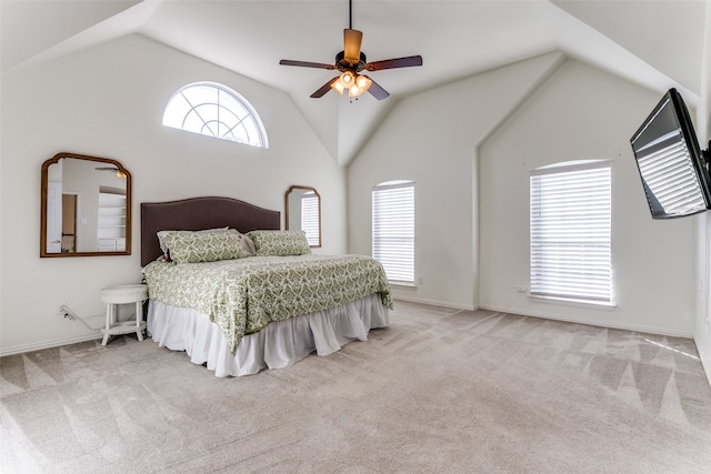 bedroom featuring light carpet, ceiling fan, and lofted ceiling