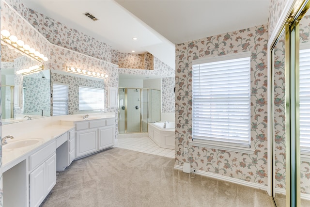 bathroom featuring separate shower and tub, tile patterned floors, plenty of natural light, and vanity