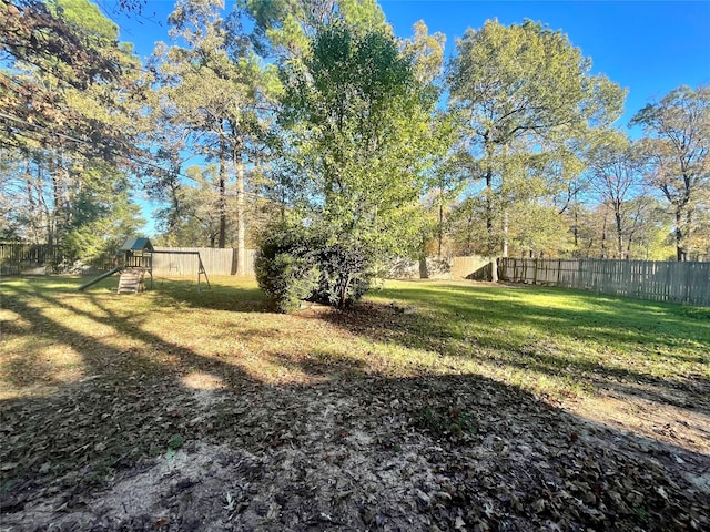 view of yard featuring a playground