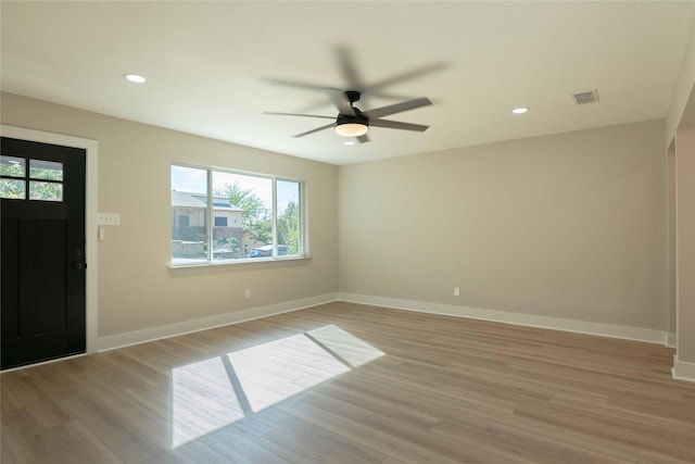 entrance foyer featuring ceiling fan and light hardwood / wood-style flooring