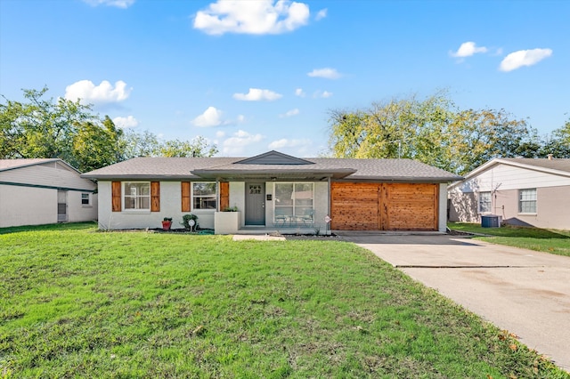 ranch-style home with central AC, a porch, and a front yard