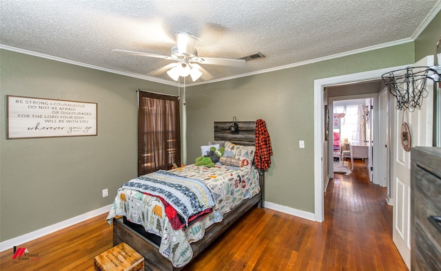 bedroom featuring ceiling fan, dark hardwood / wood-style flooring, and crown molding