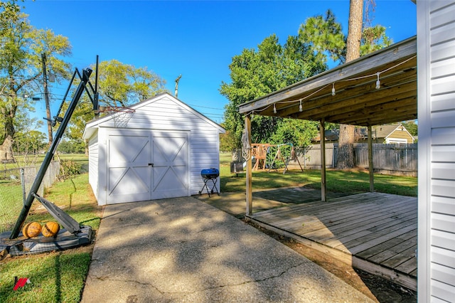 3756 Greenway Pl, Shreveport, LA 71105 - detached garage with concrete driveway and a storage unit