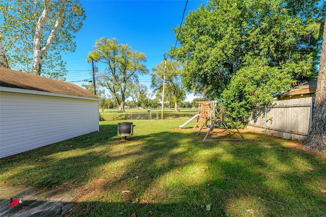 view of yard featuring a playground