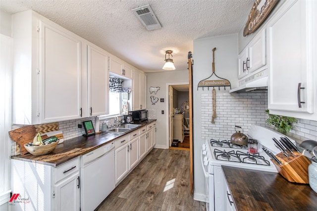 kitchen with white cabinets, white appliances, dark wood-type flooring, and sink