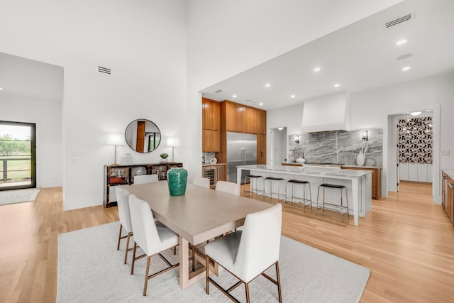 7517 Sunnyview Ln, Flower Mound, TX 75022 - dining room featuring light wood-type flooring, visible vents, and recessed lighting