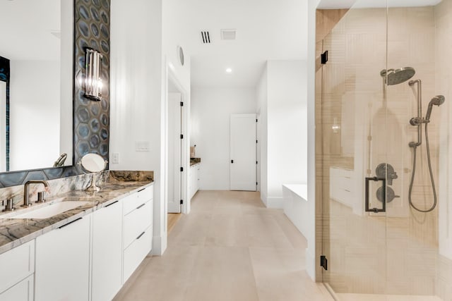 7517 Sunnyview Ln, Flower Mound, TX 75022 - full bath with a stall shower, vanity, and visible vents