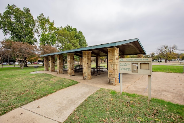 view of home's community with a gazebo and a yard