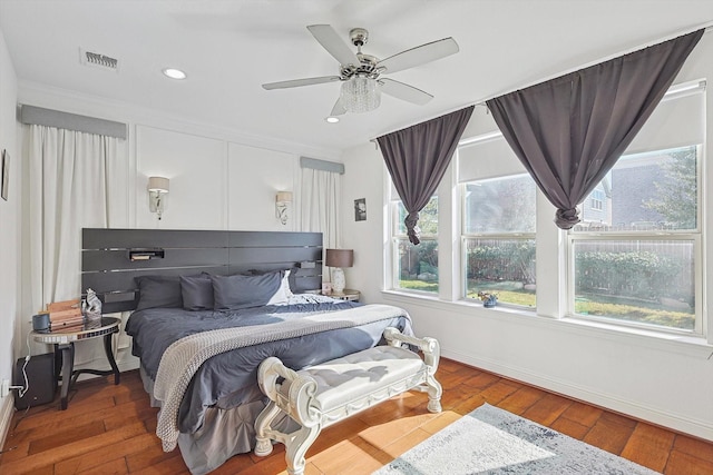 bedroom featuring hardwood / wood-style floors and ceiling fan