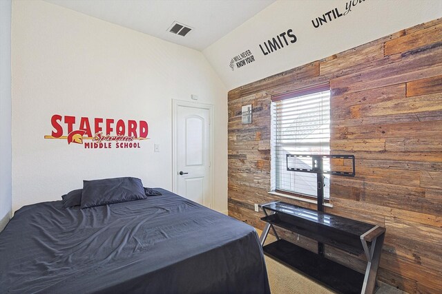 carpeted living room with lofted ceiling and ceiling fan