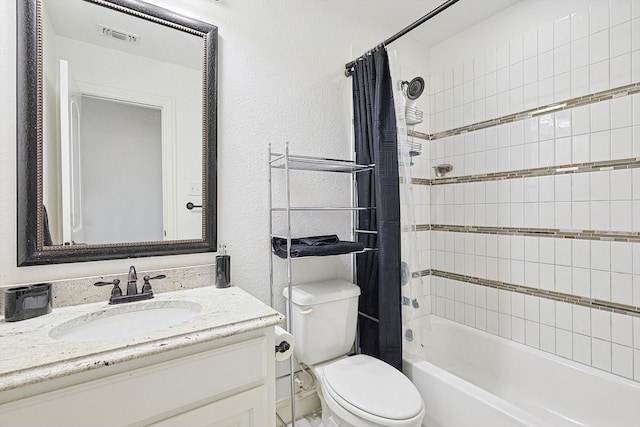 full bathroom featuring vanity, shower / tub combo, and toilet