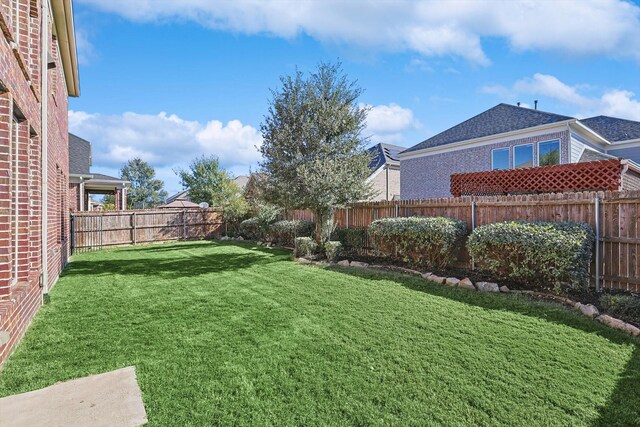 view of yard featuring central AC