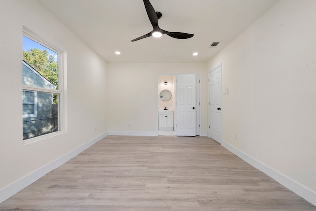 entrance foyer featuring light hardwood / wood-style floors and ceiling fan