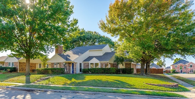 view of front of house with a front lawn