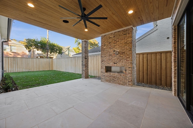 view of patio featuring ceiling fan