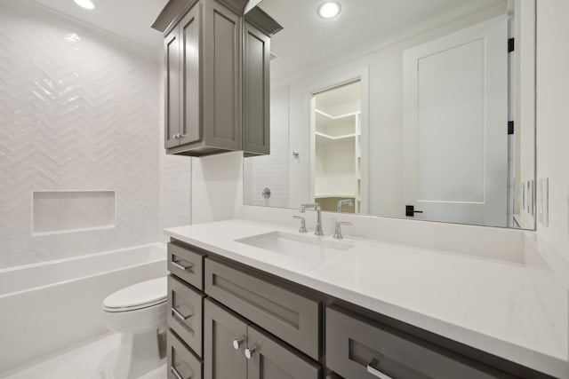 full bathroom with crown molding, vanity,  shower combination, and toilet