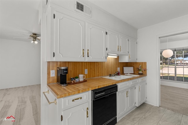 kitchen with dishwasher, white cabinetry, ceiling fan, and sink