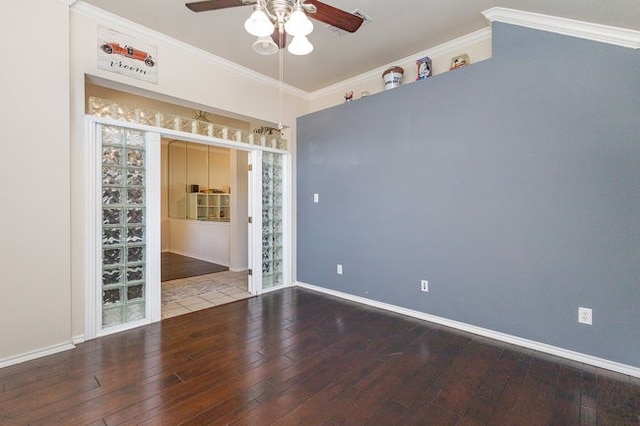 unfurnished room featuring ceiling fan, wood-type flooring, and crown molding