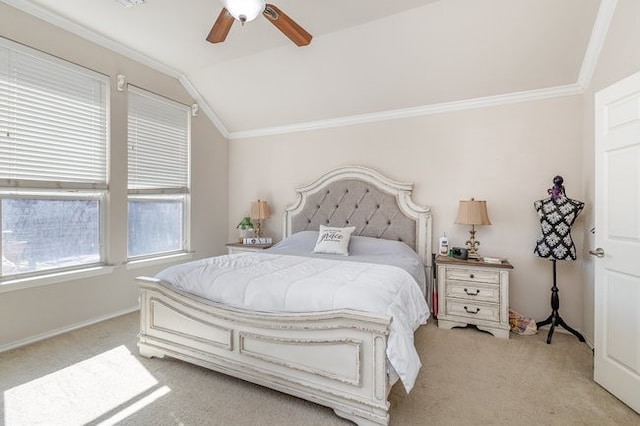 bedroom featuring ceiling fan, light colored carpet, lofted ceiling, and crown molding