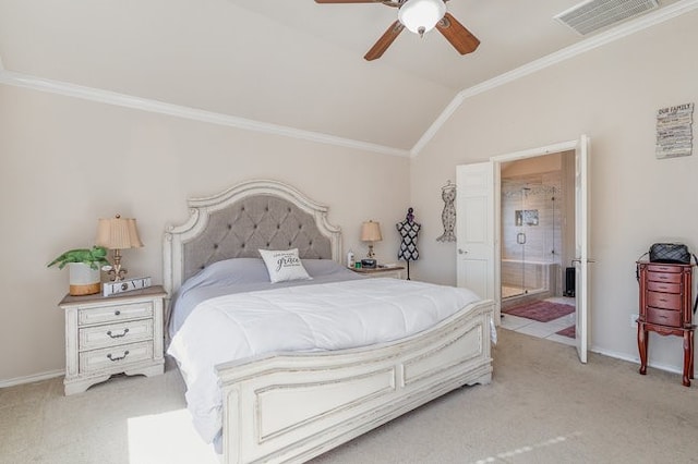 bedroom featuring connected bathroom, crown molding, ceiling fan, and lofted ceiling