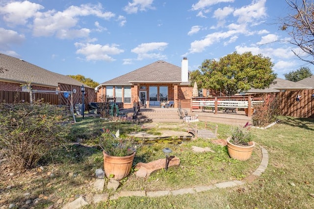 view of yard with a deck