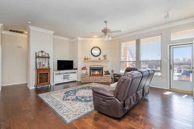 living room with ceiling fan, dark hardwood / wood-style flooring, and crown molding