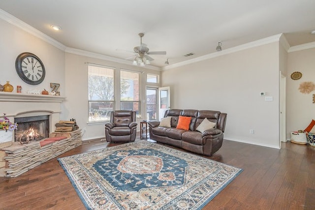 living room with ceiling fan, dark hardwood / wood-style flooring, and ornamental molding