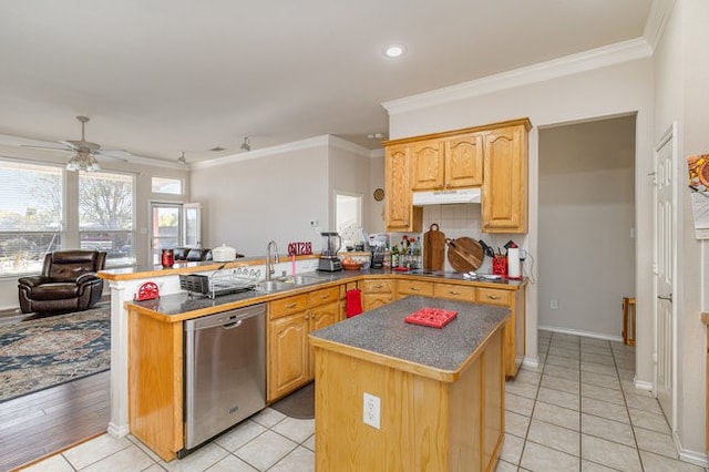 kitchen with dishwasher, a center island, crown molding, sink, and kitchen peninsula