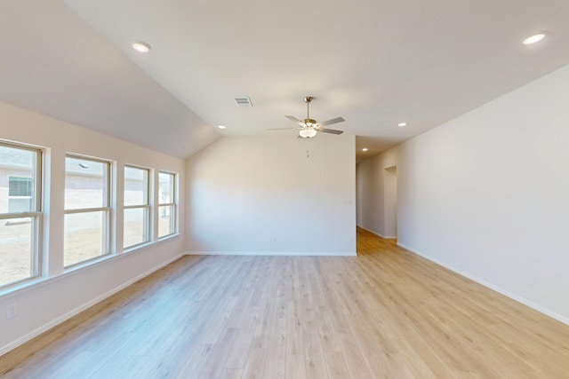 unfurnished room with light wood-type flooring, baseboards, visible vents, and recessed lighting