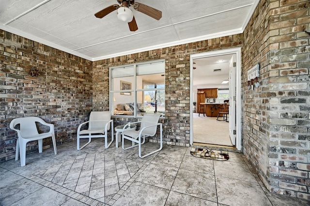 view of patio / terrace with ceiling fan