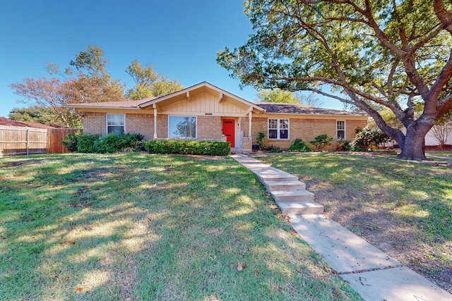 ranch-style home featuring a front lawn