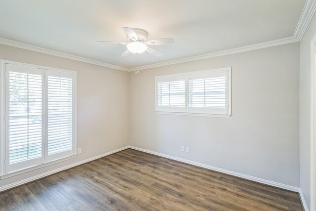 empty room with plenty of natural light, ceiling fan, ornamental molding, and dark wood-type flooring