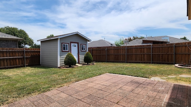 view of patio featuring a shed