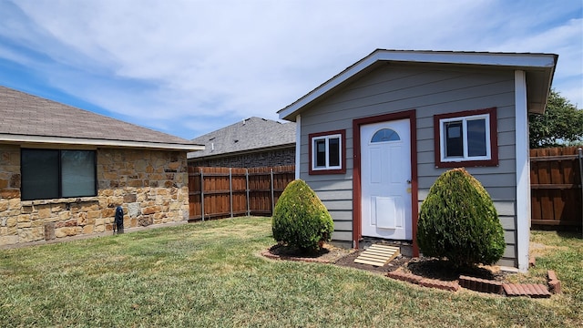 exterior space with a lawn