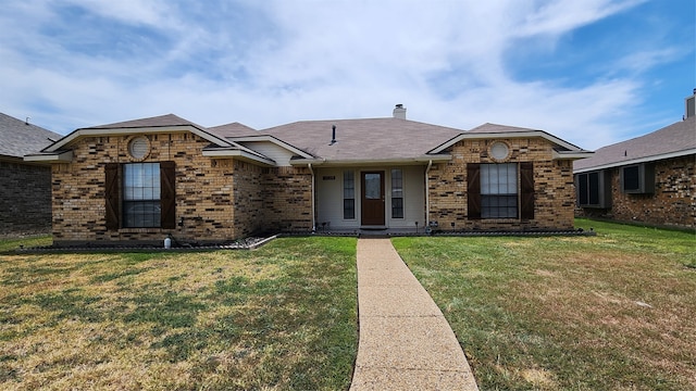 single story home featuring a front yard