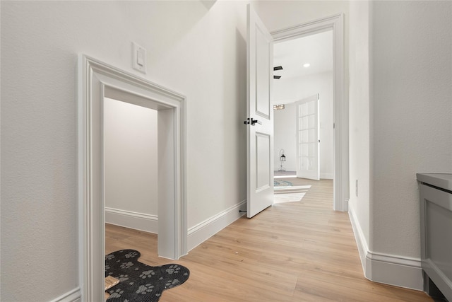 hall featuring light wood-type flooring