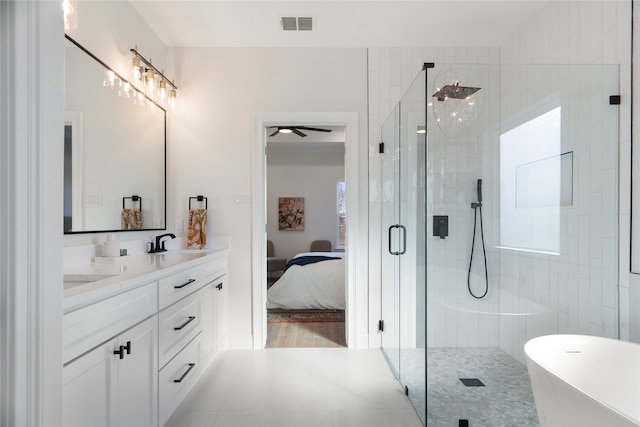 bathroom featuring vanity, ceiling fan, and plus walk in shower