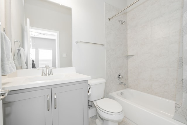 full bathroom featuring shower / tub combo, vanity, and toilet