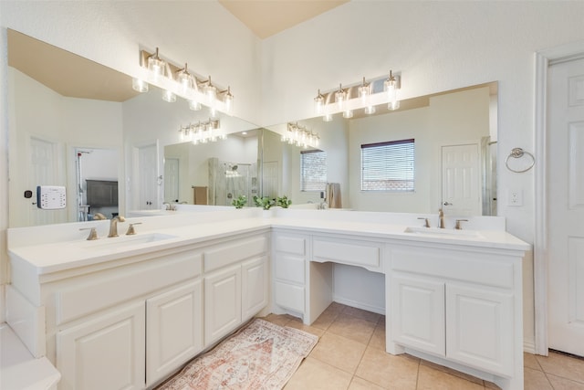 bathroom featuring tile patterned floors and vanity