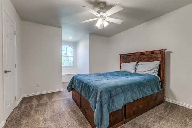 carpeted bedroom with ceiling fan