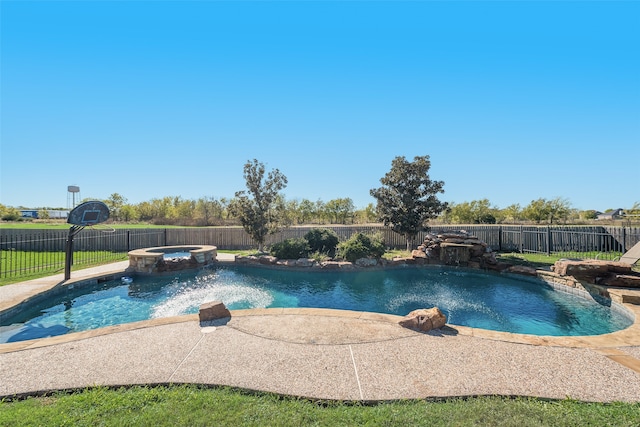 view of pool featuring an in ground hot tub