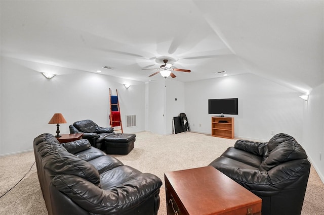 living room with vaulted ceiling and carpet flooring