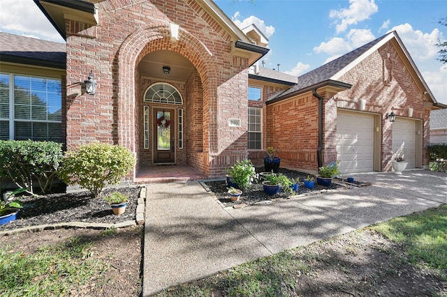 entrance to property featuring a garage