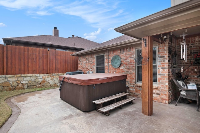 view of patio featuring a hot tub