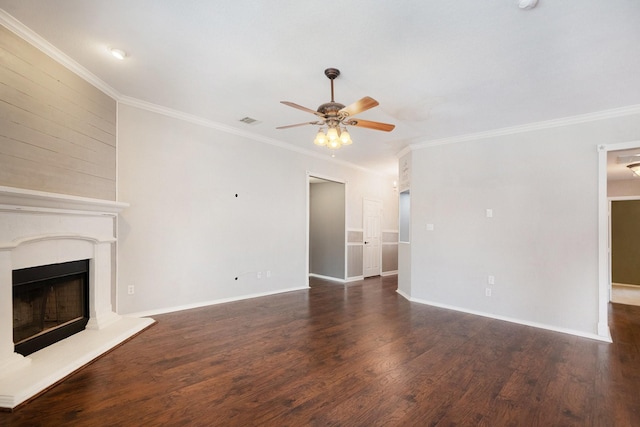 unfurnished living room featuring ceiling fan, ornamental molding, and dark hardwood / wood-style floors