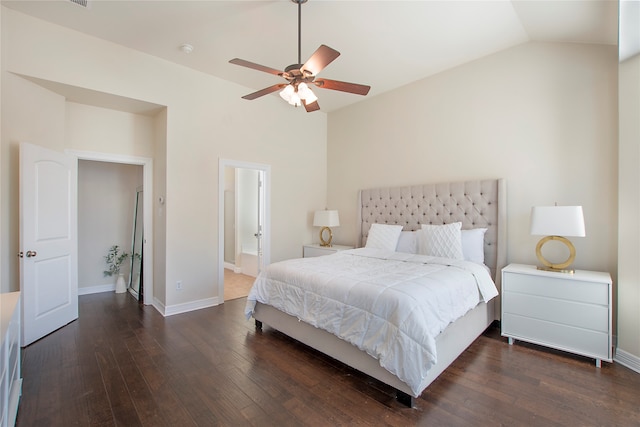 bedroom with ceiling fan, dark hardwood / wood-style flooring, and lofted ceiling